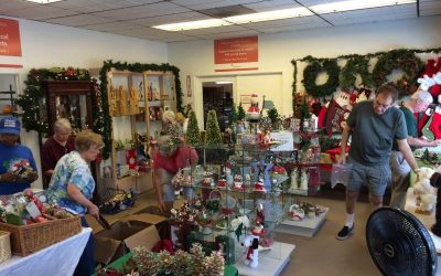 TIAA volunteers set up CitySquare Christmas in July store on July, 2015