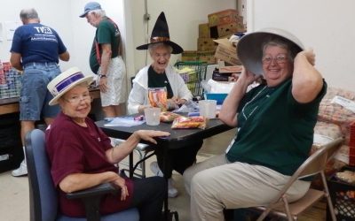 TIAA volunteers have fun while working at the White Rock Center of Hope in October, 2015.
