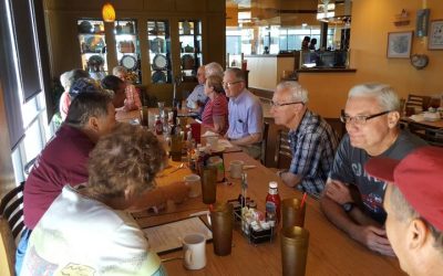 TI retirees enjoy talking and eating together on the third Friday of the month.
