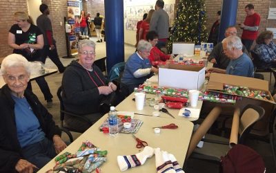 Sixteen TIAA members wrapped small gifts for the Meals-On-Wheels folks in December, 2016.