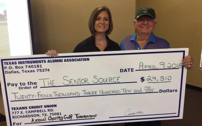 Courtney Miller presents a check for $24,310 to The Senior Source from the 2018 golf tournament.